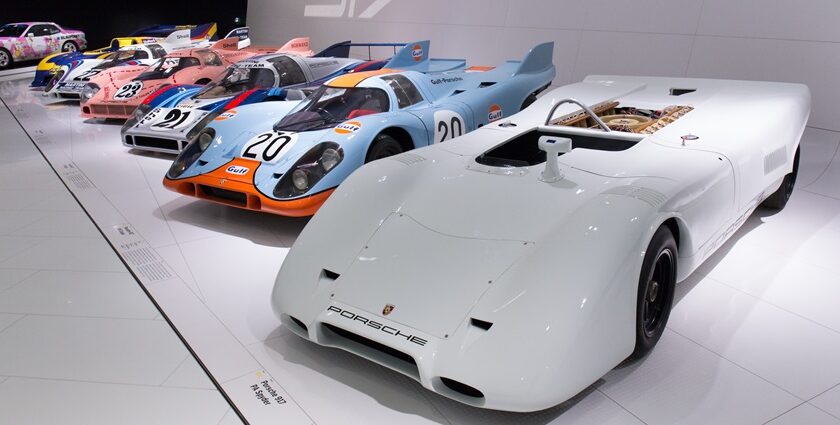 An image of a Porsche 917 series displayed at the Porsche Museum highlights its design