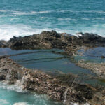 An image of the surreal views of a Portugal beach of Porto Covo with waves crashing