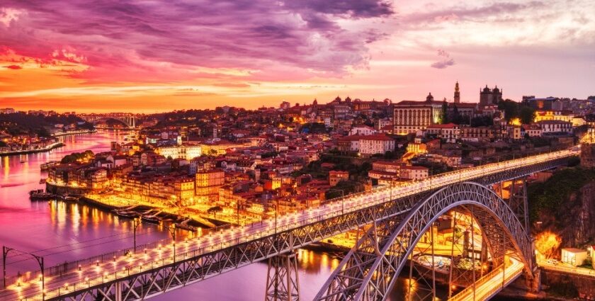 A vibrant view of a street in Lisbon, a place to witness the vibrant Portugal nightlife.