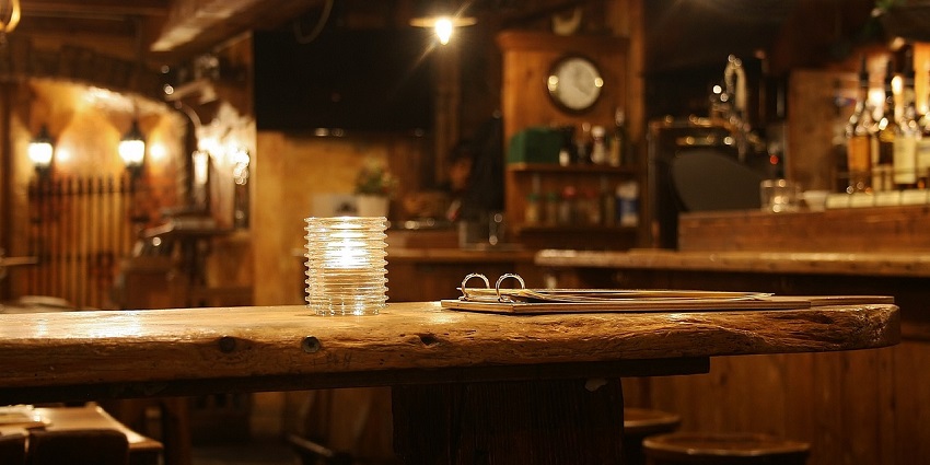 Cozy interior seating with rustic decor, similar to experience Porvoo’s Old Town pubs