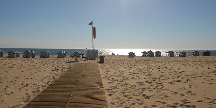 Praia da Figueira, one of the most secluded beaches near Lisbon surrounded by cliffs.