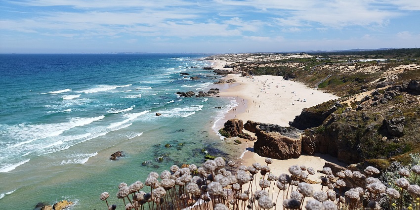 Explore the untouched beauty of Praia do Malhao, offering lovely sunsets and calm vibes.