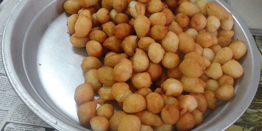 Punugulu is a flavourful street food in Vijayawada.