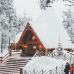 An image of the Ranua Zoo main building covered in snow, creating a winter wonderland.