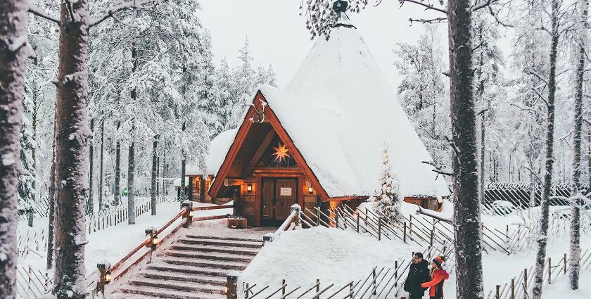 An image of the Ranua Zoo main building covered in snow, creating a winter wonderland.