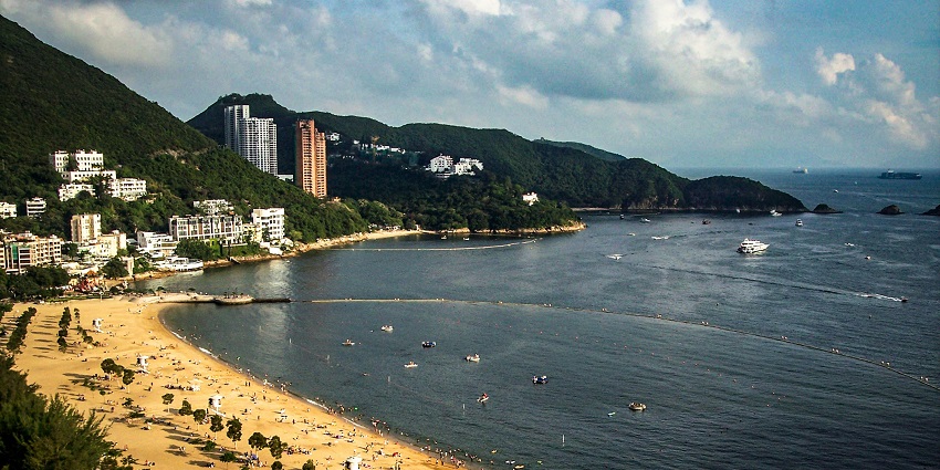 Repulse Bay Beach on the southern coast is known for its soft, golden sand and clear waters.