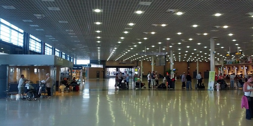 Interior of a terminal in Reus airport against a spectacular view.