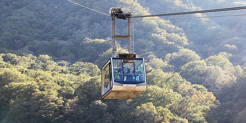 Cable car ride offering panoramic views of Seoraksan National Park in South Korea.