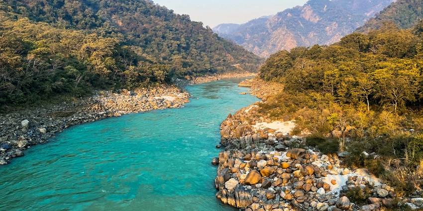 An image of the Ganges River in Rishikesh, the yoga hub of India.