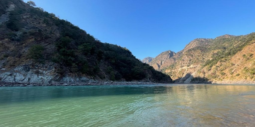 An image of the Ganges River in Rishikesh, a spiritual and adventure-filled destination in October.