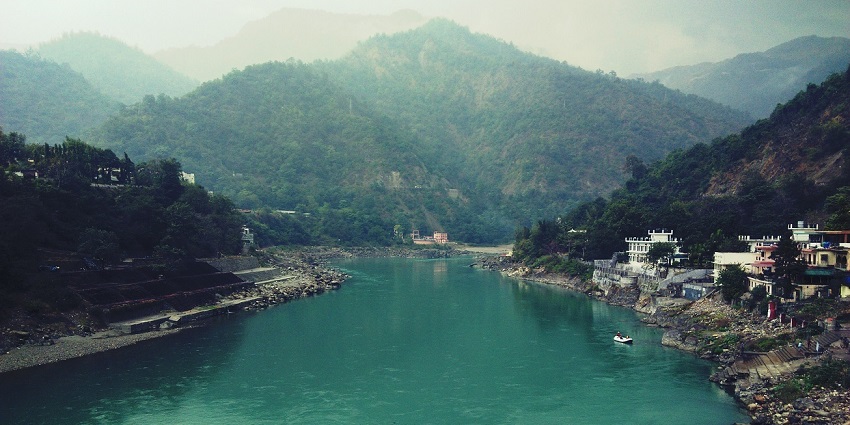 An image of the Ganges River in Rishikesh, a spiritual and adventure-filled destination