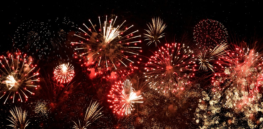Fireworks illuminate the night sky during New Year in Italy celebrations.