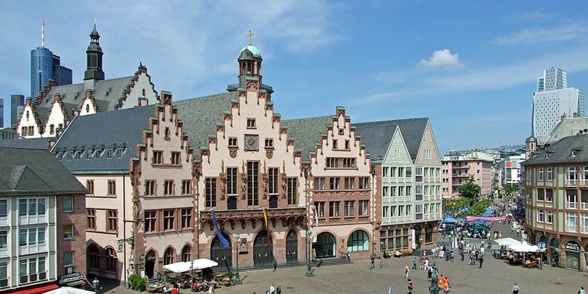 View of Römerberg with typical architecture and vibrant street, a sight to behold.