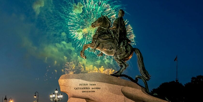 Monument against Night Sky with Fireworks - Russian New Year celebration with fireworks