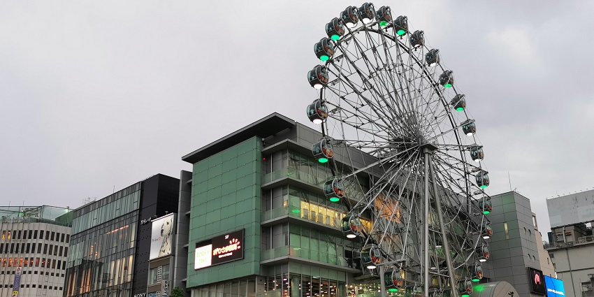 A glimpse of vibrant district in Nagoya with shopping, dining, and entertainment options.