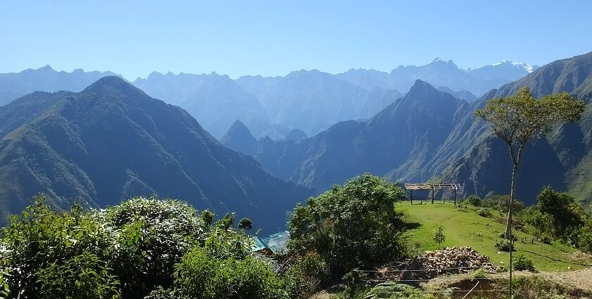 Hikers stand triumphantly at Salkantay Mountain after completing their scenic Salkantay trekking.