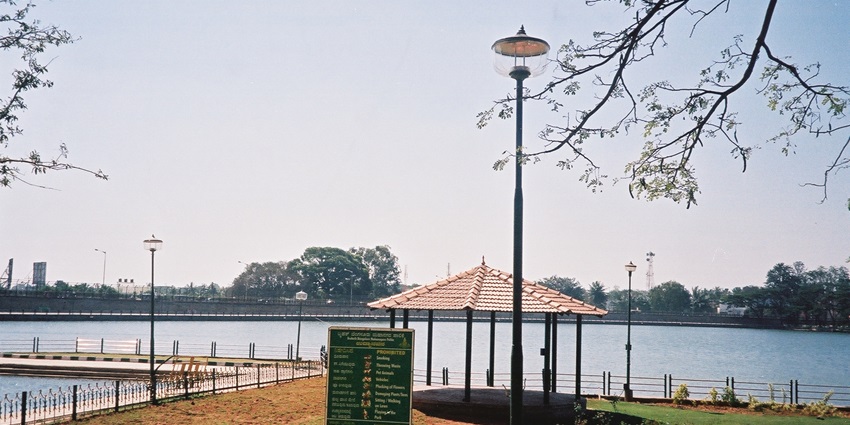Sankey Tank in Bangalore, a serene lake surrounded by lush greenery and walkways.