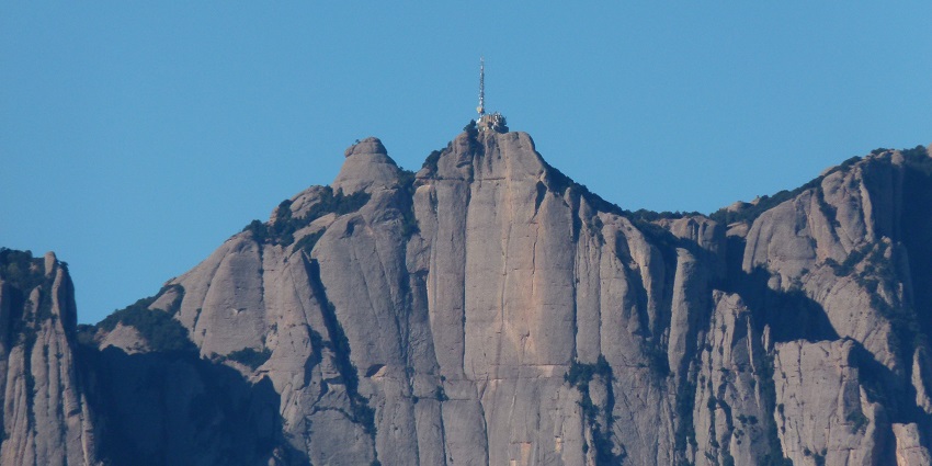 Tourists enjoying the park near Montserrat monastery - one of the best places to visit near