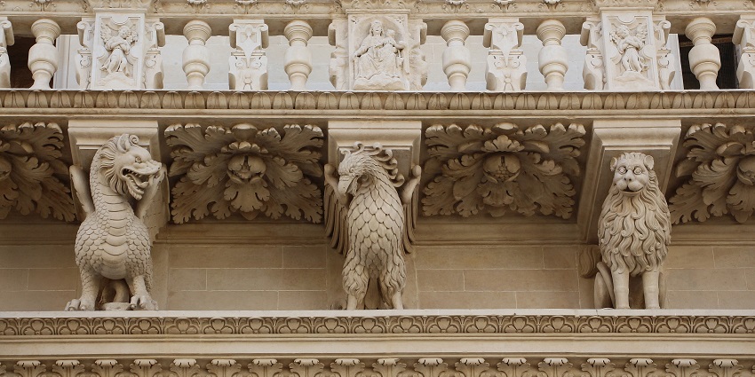 A view of the detailed and beautiful facade of Santa Croce Church.