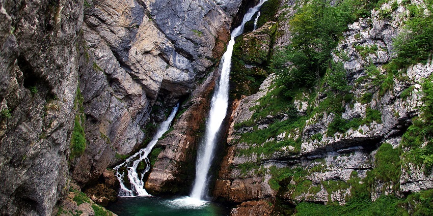 Mesmerising view of Savica Waterfall at the Triglav National Park, surrounded by rocks