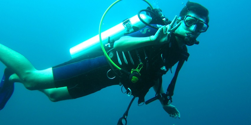 Discover coral reefs, and marine biodiversity underwater while scuba diving in Coron.