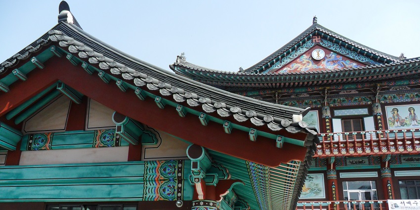 Tranquil temple nestled in mountains, known for its autumn foliage and meditation retreats.