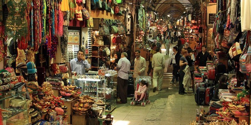 A picture of a bustling market in Kharagpur with numerous shops and stalls selling various items