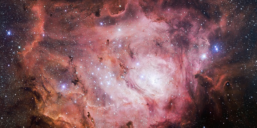 An image of the Lagoon Nebula, resembling an astronomy presentation at Science Centre