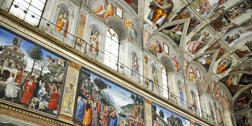 Iconic Michelangelo frescoes adorn the Sistine Chapel’s ceiling.