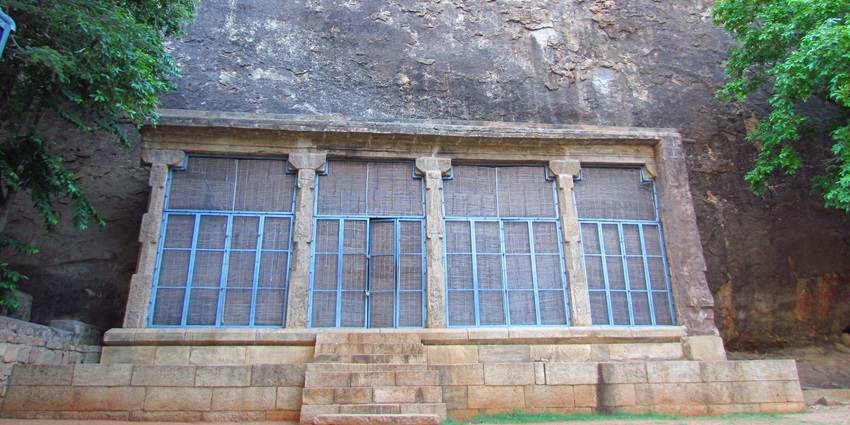 An image of one of the famous rock-cut Jain monasteries from the 7th century in Sittanavasal Cave