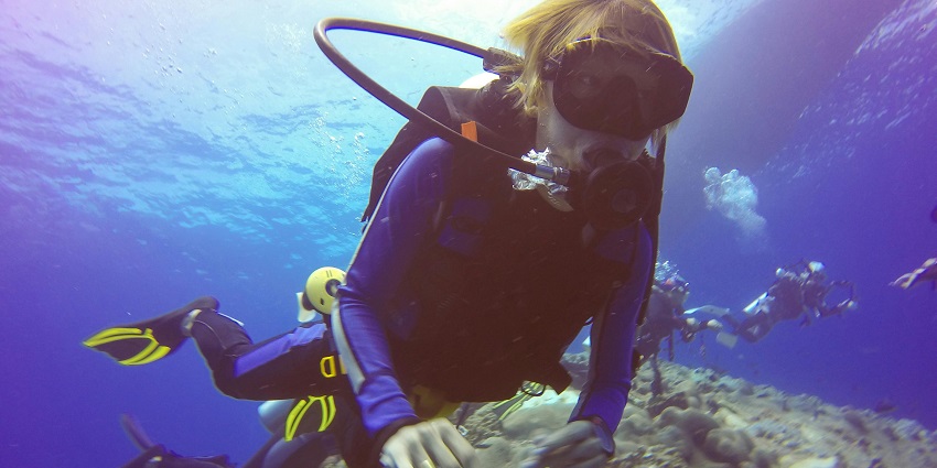 An image of a snorkeler observing underwater life, one of the best water sports in Lonavala.