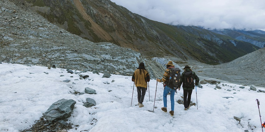 Adventurous winter trekking through snow-covered landscapes and trails.