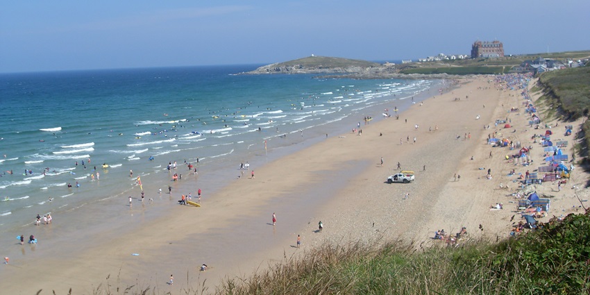 Fistral Beach is a top destination for surfing and coastal adventures, making it one of the best things to do in the UK.