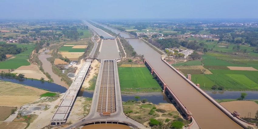Solani Aqueduct of the Ganges Canal, spanning over a river with scenic greenery around