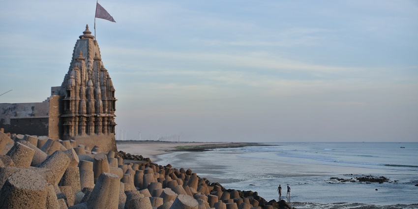 Huge waves approaching Somnath Beach, gradually settling as they reach the shore.