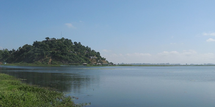 An image of Son Beel, one of the largest seasonal lakes in Assam, India, reflecting the sky.