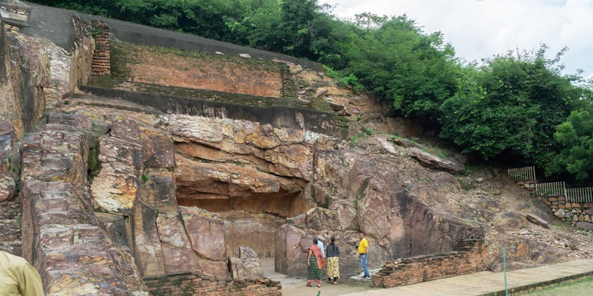 An image of Jain caves at Son Bhandar, with rock-cut sculptures and inscriptions in Bihar