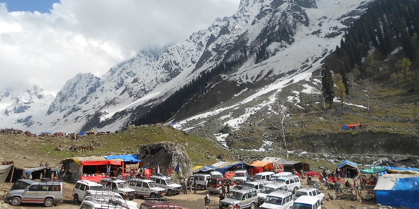 Tourist vehicles parked at Thajiwas Glacier near Sonamarg in Jammu and Kashmir.