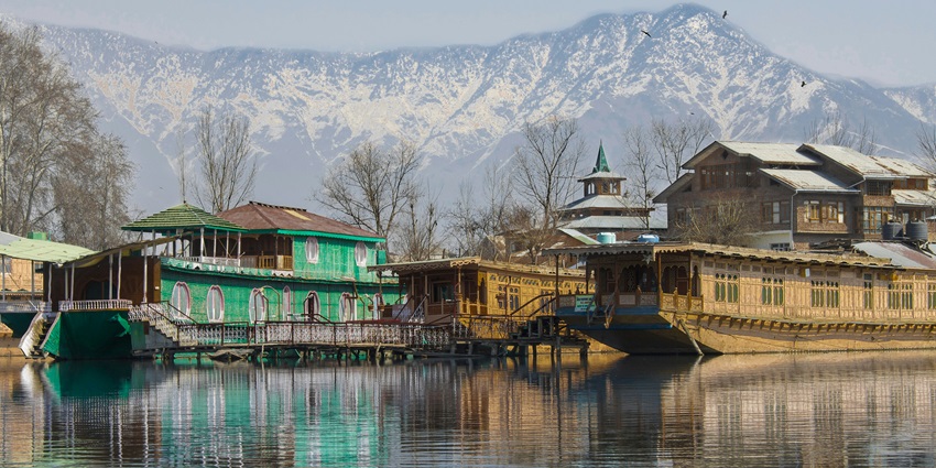 A breathtaking view of the Dal Lake in Srinagar with colourful houseboats on it.