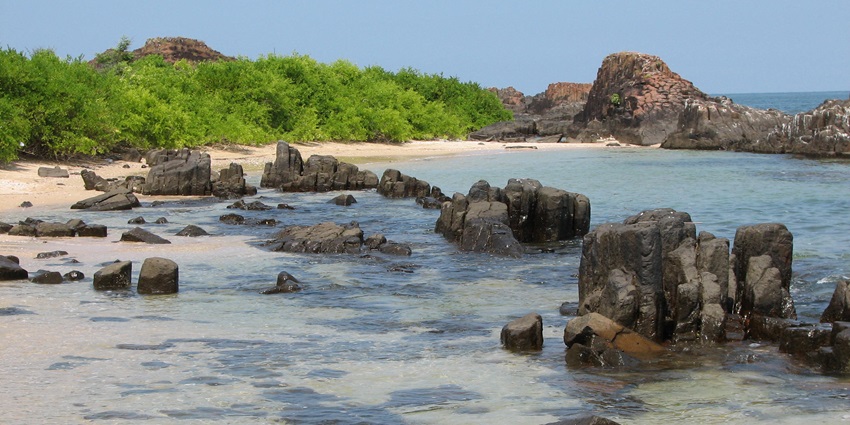 An image showing the unique rock formations at St. Mary’s Island, known for basalt columns.