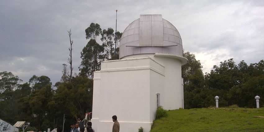 A group of visitors at Kodaikanal Solar Observatory near Kodaikanal Lake in Tamil Nadu