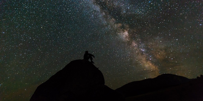 Marvel at the night sky filled with countless stars.
