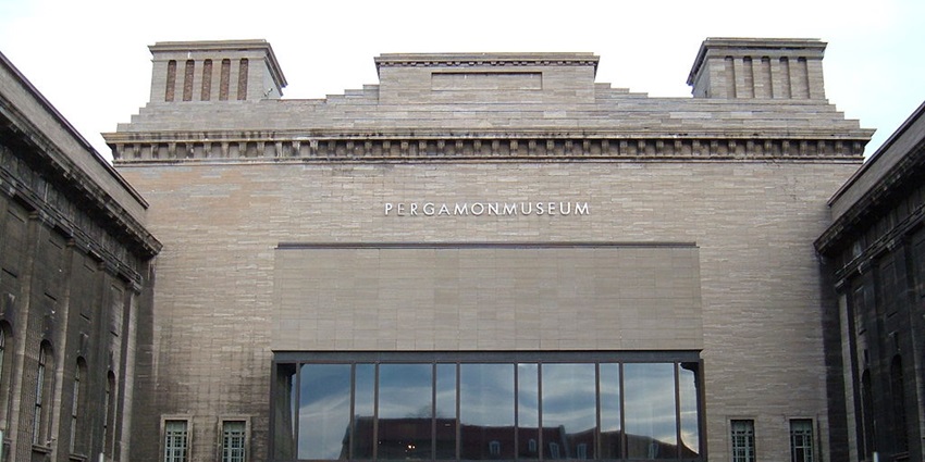 An image showing the entrance to the Pergamon museum, featuring its impressive facade