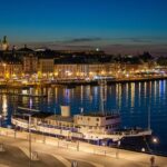 An image showing illuminated Stockholm at night, capturing the Stockholm nightlife.