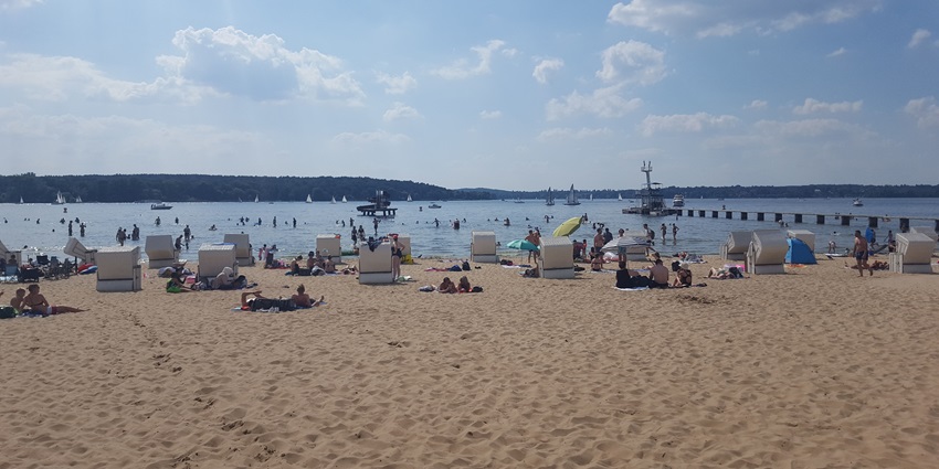 An image showing Strandbad Wannsee in summer, a vibrant spot among the famous beaches in Berlin
