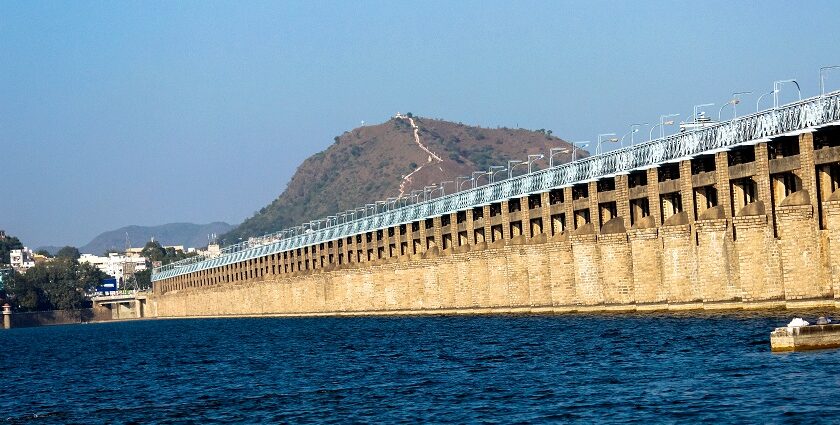 Serene scene of Vijayawada, showing the bridge amidst the greenery.