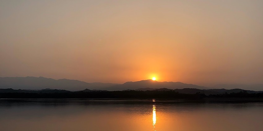 A beautiful reflection of the Sun during Sunrise in Sukhna Lake in Chandigarh