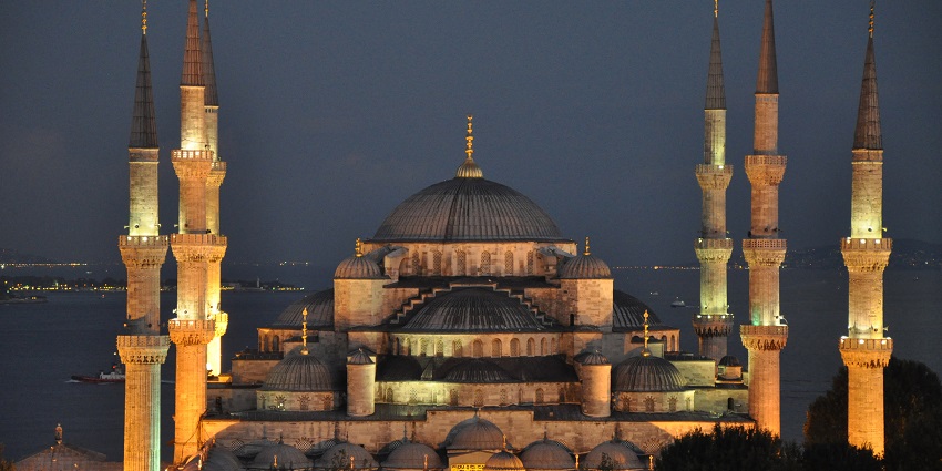 An image of Sultan Ahmed Mosque in Hamburg, highlighting its vibrant dome and minarets