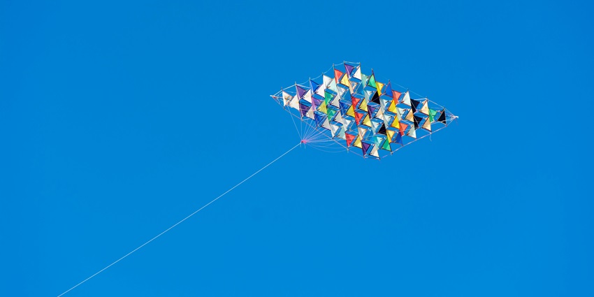 A picture showing people engaged in kite-flying competitions in Surat during Uttarayan the harvest festival of Gujarat.