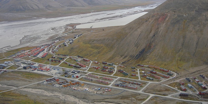 An image showing a panoramic view of Longyearbyen, Svalbard, from a nearby mountain